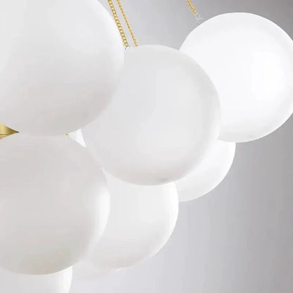 DecorBites LED pendant chandelier cluster of white glass spheres with gold chains on Tampa Home & Garden Store