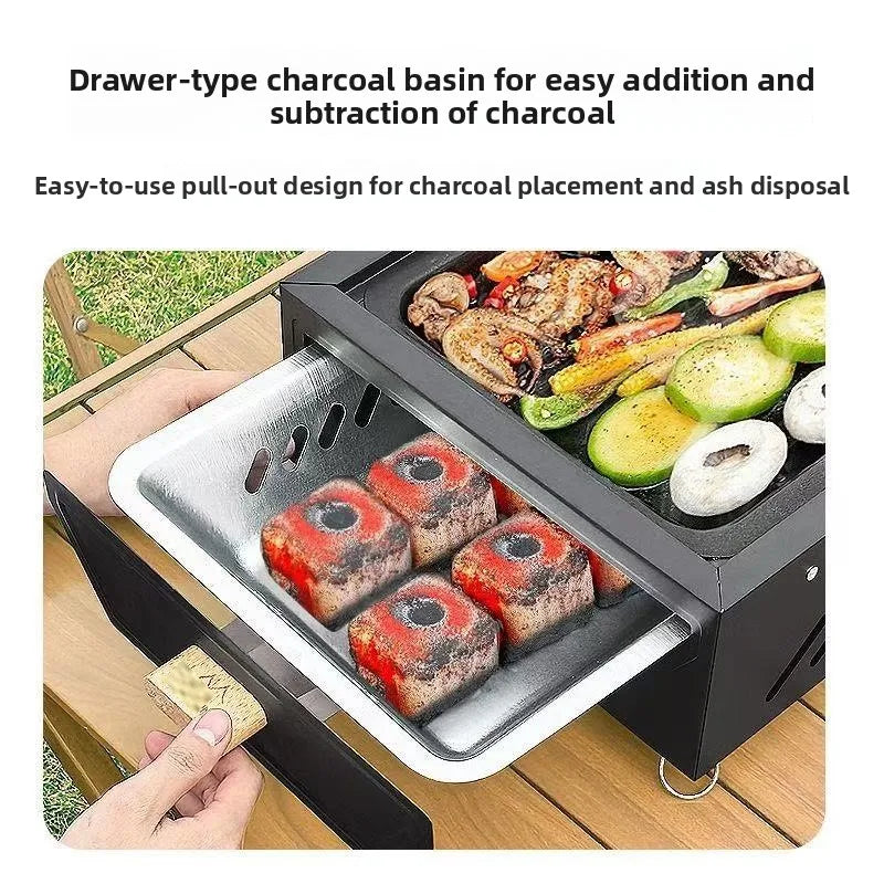 Portable black charcoal grill with pullout ash tray; four briquettes grill veg and meat on Tampa Home & Garden Store