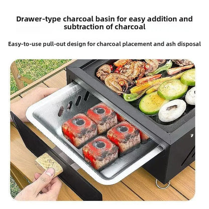Portable black charcoal grill with pullout ash tray; four briquettes grill veg and meat on Tampa Home & Garden Store