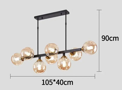 DecorBites LED pendant chandelier with six amber glass globes on a black bar ceiling mount on Tampa Home & Garden Store
