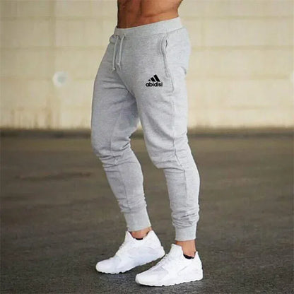 Men joggers gray baggy sweatpants by UpTrend Deals with drawstring waist and cuffed ankles, small logo on left thigh on Tampa Home & Garden Store