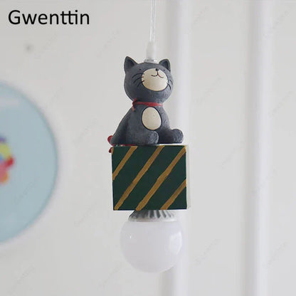 DecorBites Kids Animal Pendant Lamp gray cat figurine on a green striped block with a white LED bulb on Tampa Home & Garden Store