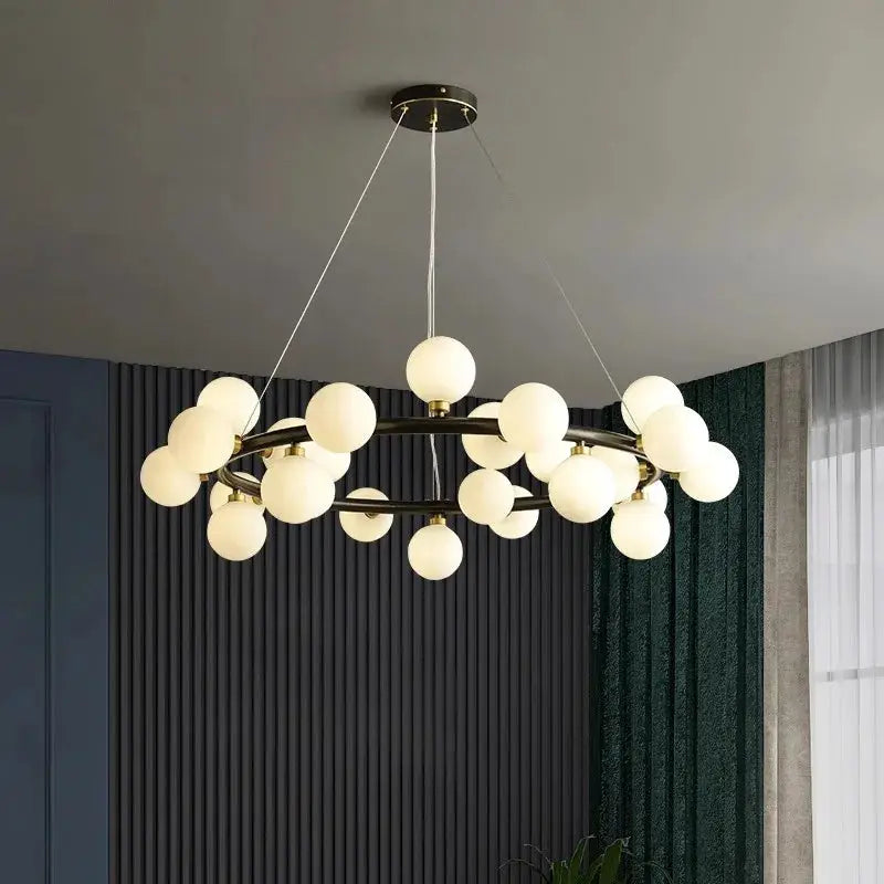 DecorBites LED pendant chandelier with brass ring and frosted glass globes for dining on Tampa Home & Garden Store