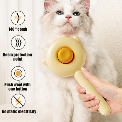 Stevvex cat and dog grooming brush with round beige massage head used on a fluffy cat on Tampa Home & Garden Store