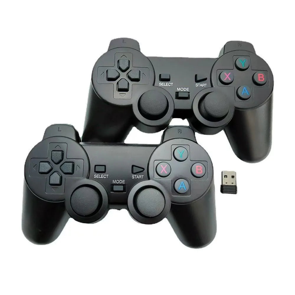 Two black USB game controllers with joysticks, D-pad, A/B/X/Y buttons, and USB dongle for PC on Tampa Home & Garden Store
