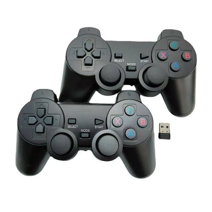 Two black USB game controllers with joysticks, D-pad, A/B/X/Y buttons, and USB dongle for PC on Tampa Home & Garden Store
