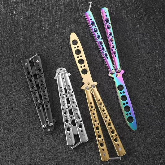 Folding butterfly knife trainer set of five in black, silver, gold, and rainbow stainless steel handles on Tampa Home & Garden Store