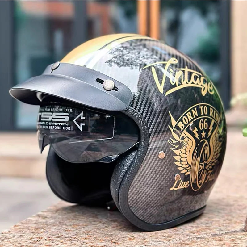 Open-face motorcycle helmet by BikerZoneZ, carbon fiber with vintage gold graphic visor on Tampa Home & Garden Store