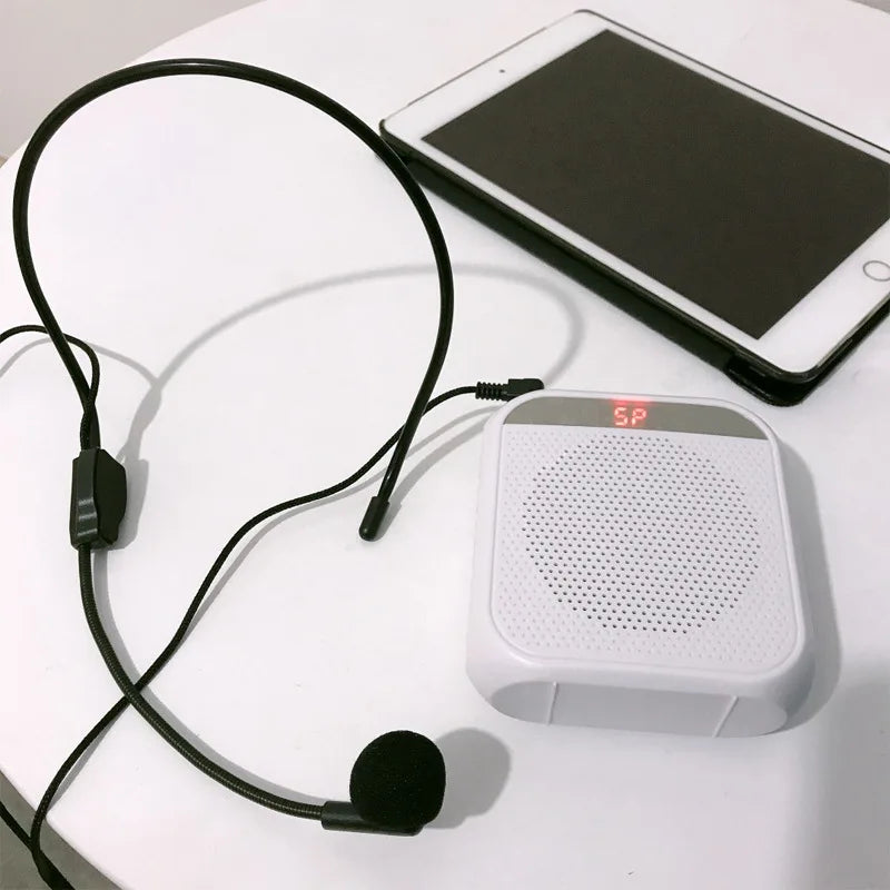 Portable microphone amplifier speaker with white body and wired headset mic, classroom use on Tampa Home & Garden Store