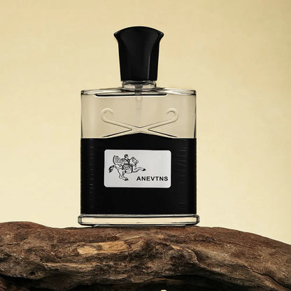 Perfume bottle with black cap, clear glass and black band label on Tampa Home & Garden Store