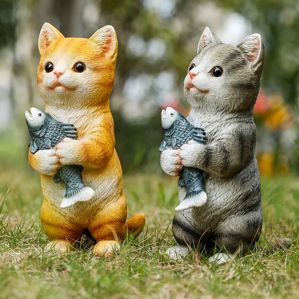 Cat figurine set: two orange and gray striped outdoor garden statues holding fish on Tampa Home & Garden Store