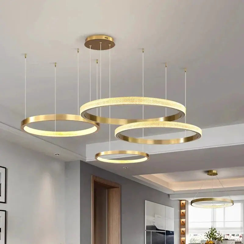 DecorBites LED four-ring gold pendant chandelier for modern living room and dining room on Tampa Home & Garden Store