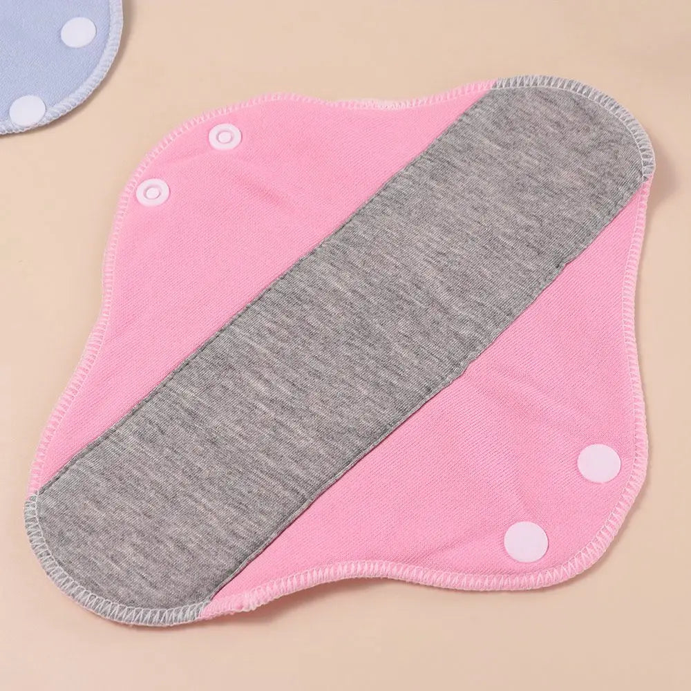 Silcy Skin pink reusable menstrual cloth pad 23cm with grey graphene core and snap closures on Tampa Home & Garden Store