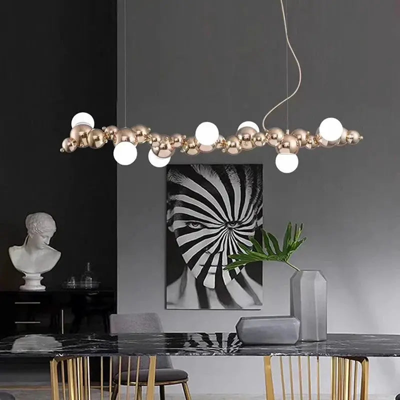 DecorBites™ LED pendant chandelier with gold spheres and white globes on Tampa Home & Garden Store