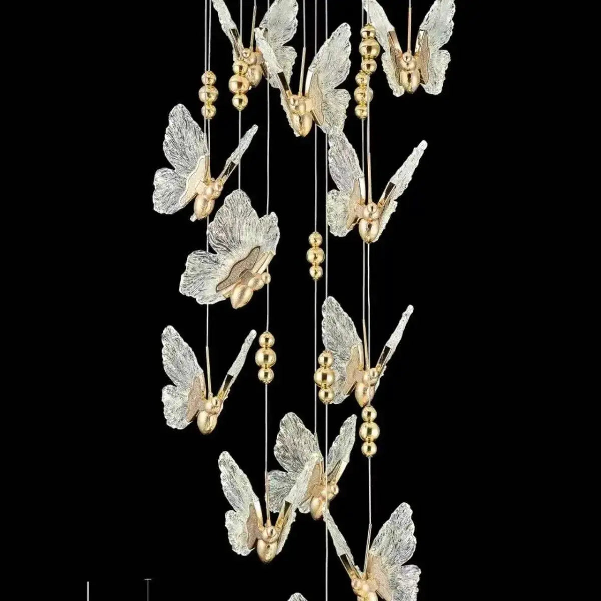 DecorBites Luxe butterfly pendant lamp strand with gold and silver butterfly charms on cords on Tampa Home & Garden Store