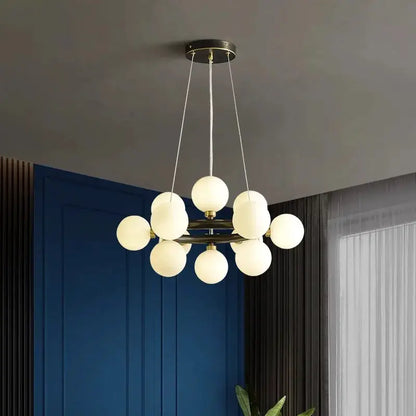 DecorBites LED pendant chandelier with brass frame and globe orbs on Tampa Home & Garden Store