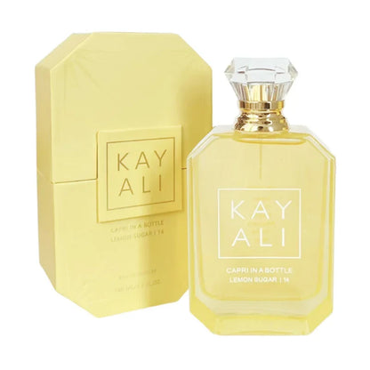 Kay Ali 100ml EDP perfume bottle with pale yellow liquid and crystal cap beside its box on Tampa Home & Garden Store
