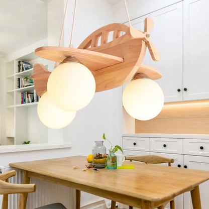 DecorBites Kids Wood Airplane Chandelier with 3 globe LED bulbs in natural wood, nursery light on Tampa Home & Garden Store