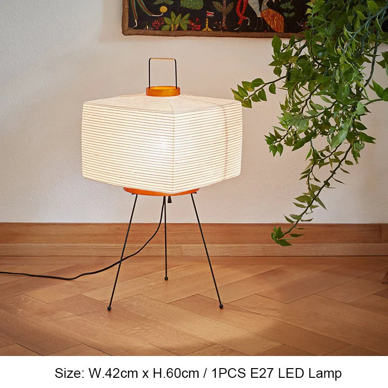 Perfecsy tripod floor lamp with rice paper shade, orange accents, black tripod legs on Tampa Home & Garden Store