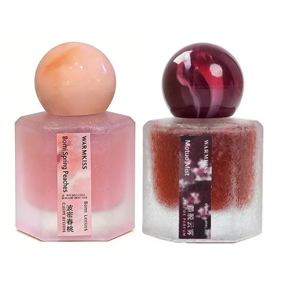 Rose perfume duo by Silcy Skin in pink frosted square bottles with round marbled caps on Tampa Home & Garden Store