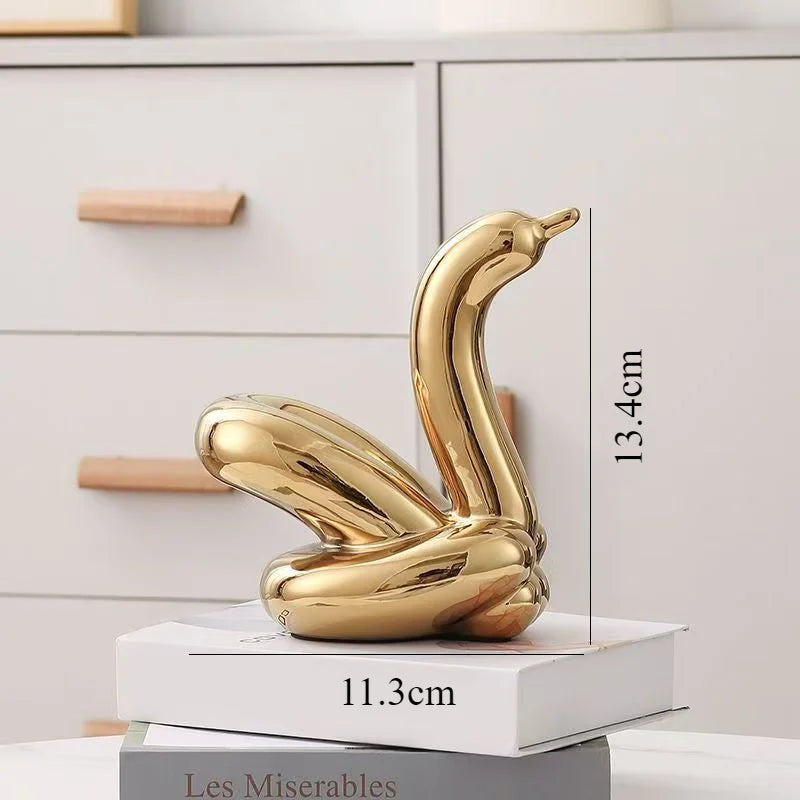 Gold ceramic abstract balloon swan sculpture decorative ornament, 13.4cm tall on Tampa Home & Garden Store