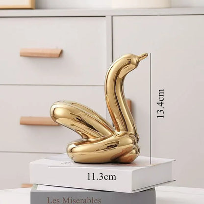 Gold ceramic abstract balloon swan sculpture decorative ornament, 13.4cm tall on Tampa Home & Garden Store
