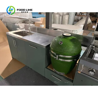 Outdoor kitchen cabinet set by FLIPSTYLEZLLC with sink and green ceramic kamado grill on Tampa Home & Garden Store