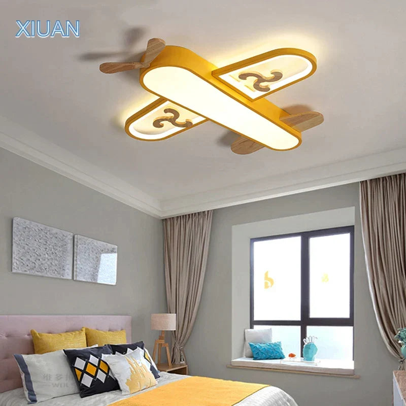 DecorBites Kids Airplane Pendant Light, wood and metal LED fixture with two yellow planes on Tampa Home & Garden Store