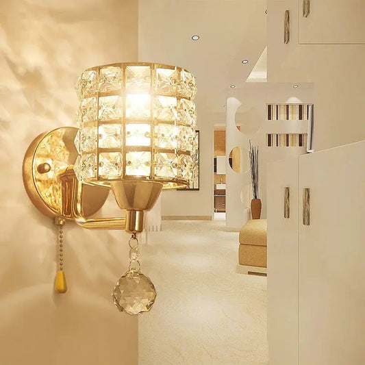 Crystal wall lamp Moktan Sabai gold brass sconce with crystal cube panels and hanging prism on Tampa Home & Garden Store