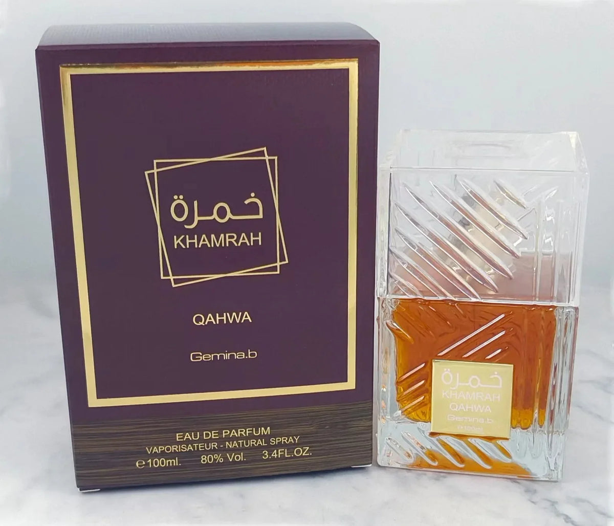 Khamrah Qahwa perfume gift set in a purple box with gold trim; clear bottle of amber 100ml on Tampa Home & Garden Store