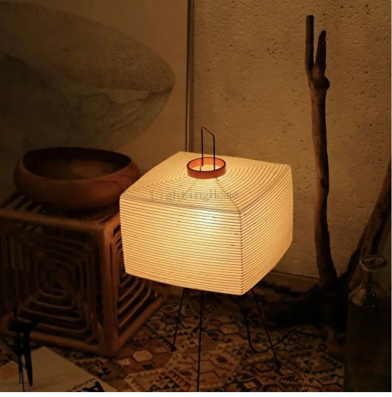Perfecsy Japanese Creative Tripod Floor Lamp with Wabi-sabi rice paper shade in warm glow on Tampa Home & Garden Store
