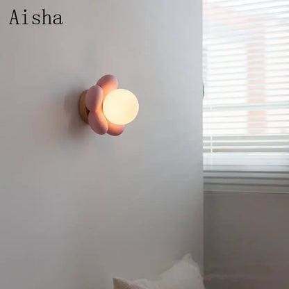 DecorBites Kids Amusement Park Flower LED Wall Lamp, pink petal with warm white globe on wall on Tampa Home & Garden Store