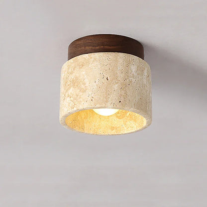 Yellow marble cylindrical ceiling light with warm glow and dark wood mount on Tampa Home & Garden Store