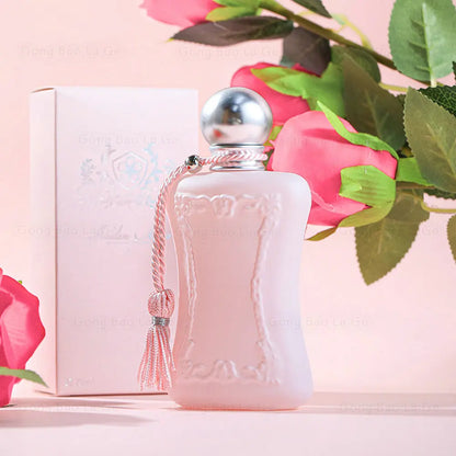 Pink frosted perfume bottle with embossed frame and silver cap, pink tassel by Silcy Skin on Tampa Home & Garden Store