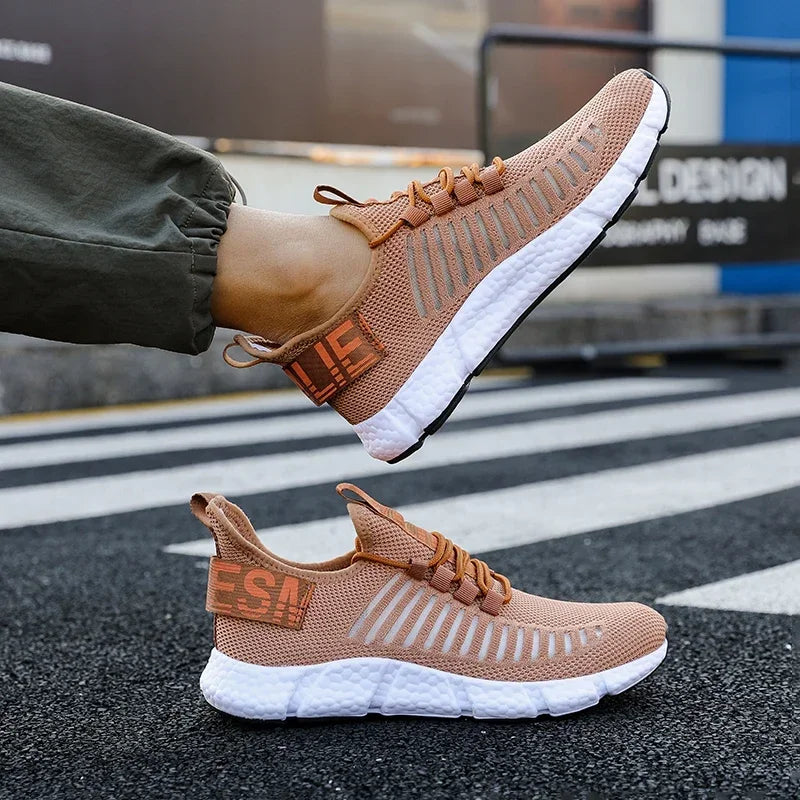Pair of training sneakers EstaliosFit breathable tan peach mesh with white cushioned sole on Tampa Home & Garden Store
