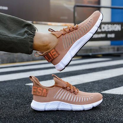 Pair of training sneakers EstaliosFit breathable tan peach mesh with white cushioned sole on Tampa Home & Garden Store