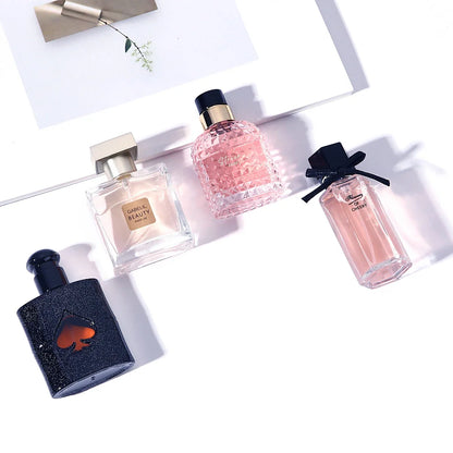 Original Women's Perfume 4-piece set with floral scents; pink diamond, navy glitter bottles on Tampa Home & Garden Store