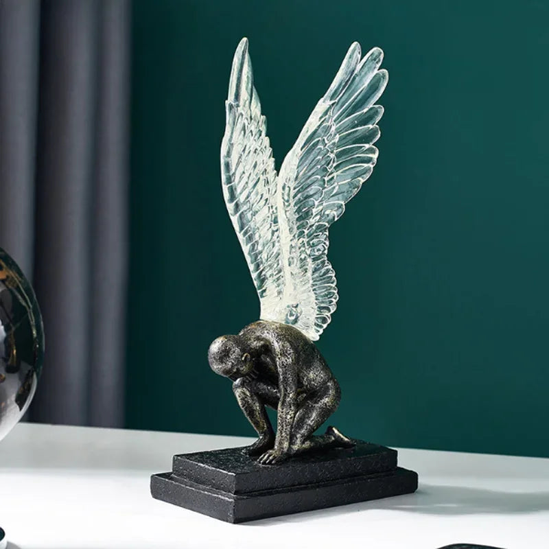 Angel Wings Model Statue resin with translucent crystal wings on a dark figure black pedestal on Tampa Home & Garden Store