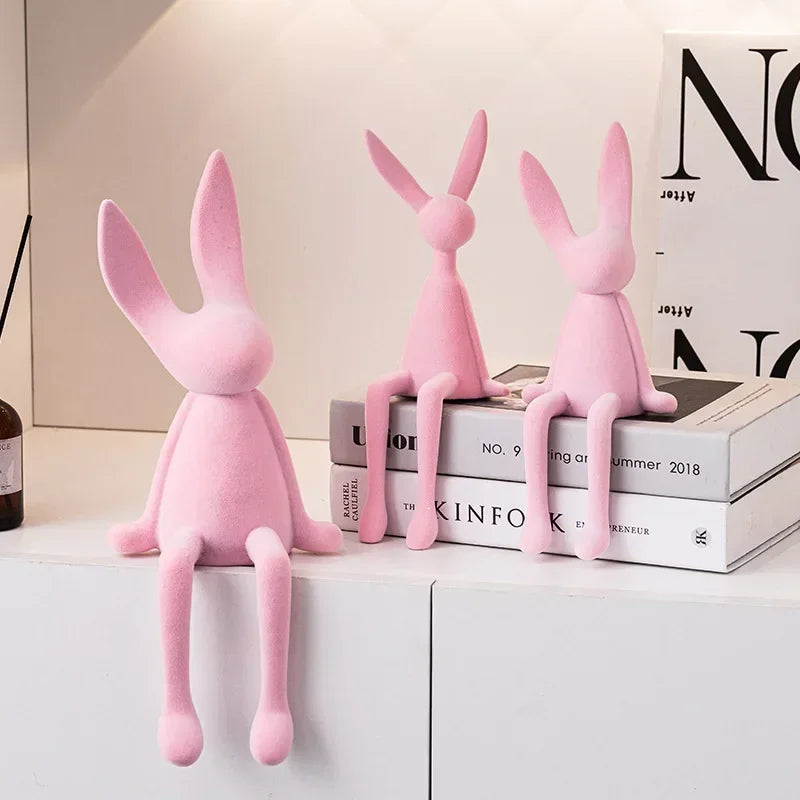 Pink resin flocked rabbit figurines, handmade bunny decor by Perfecsy, set of 3 on table on Tampa Home & Garden Store