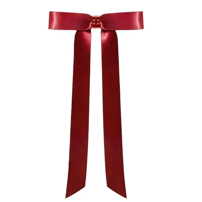 Red satin butterfly hair clip with long ribbon tails by Silcy Skin on Tampa Home & Garden Store
