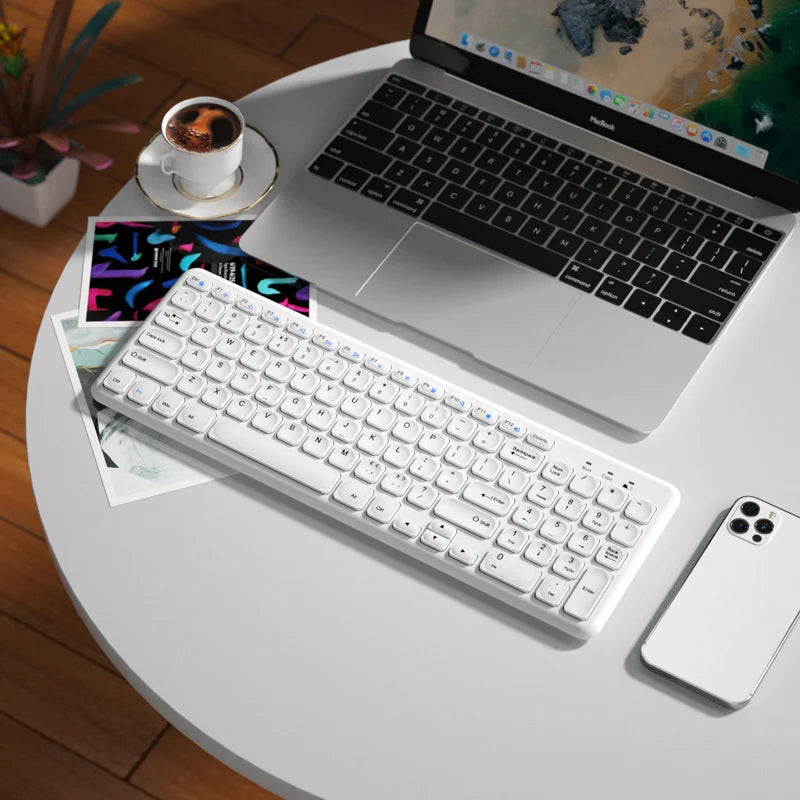 Fashion Keyboard and Mouse Set wireless white keyboard on desk beside MacBook Pro and iPhone on Tampa Home & Garden Store