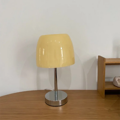 Medieval glass table lamp with beige glossy shade, chrome stem and round metal base on Tampa Home & Garden Store