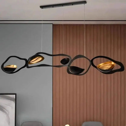 DecorBites LED pendant chandelier with black looping rings and warm amber interior lights on Tampa Home & Garden Store