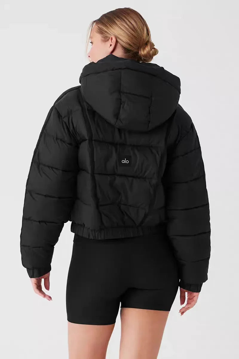 Black hooded puffer jacket for women with cropped hem; alo logo on back on Tampa Home & Garden Store