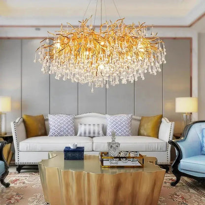 DecorBites LED pendant chandelier with gold branch frame and crystal droplets in a living room on Tampa Home & Garden Store