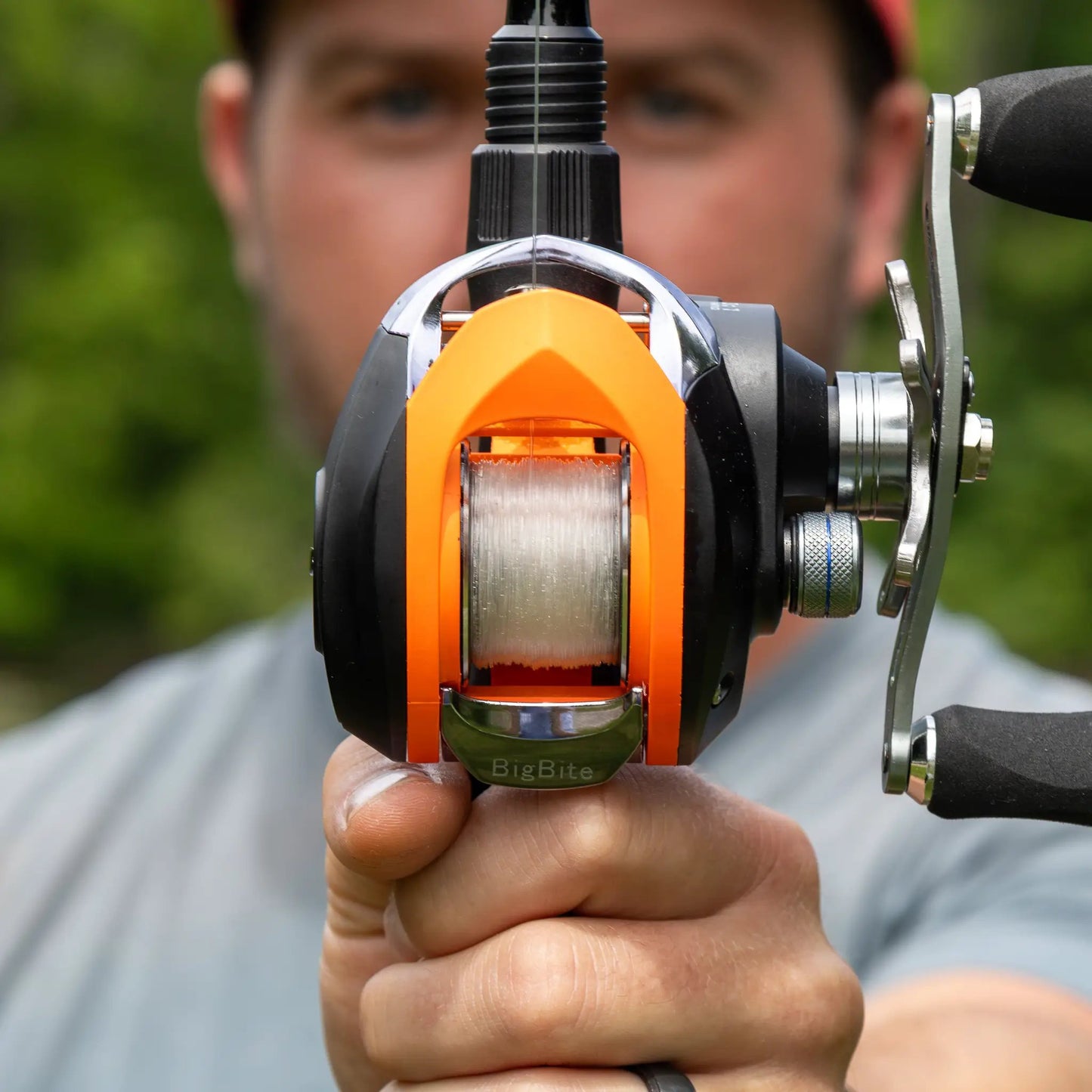 Reaction Tackle 100% Pure fluorocarbon fishing line on orange and black reel on Tampa Home & Garden Store