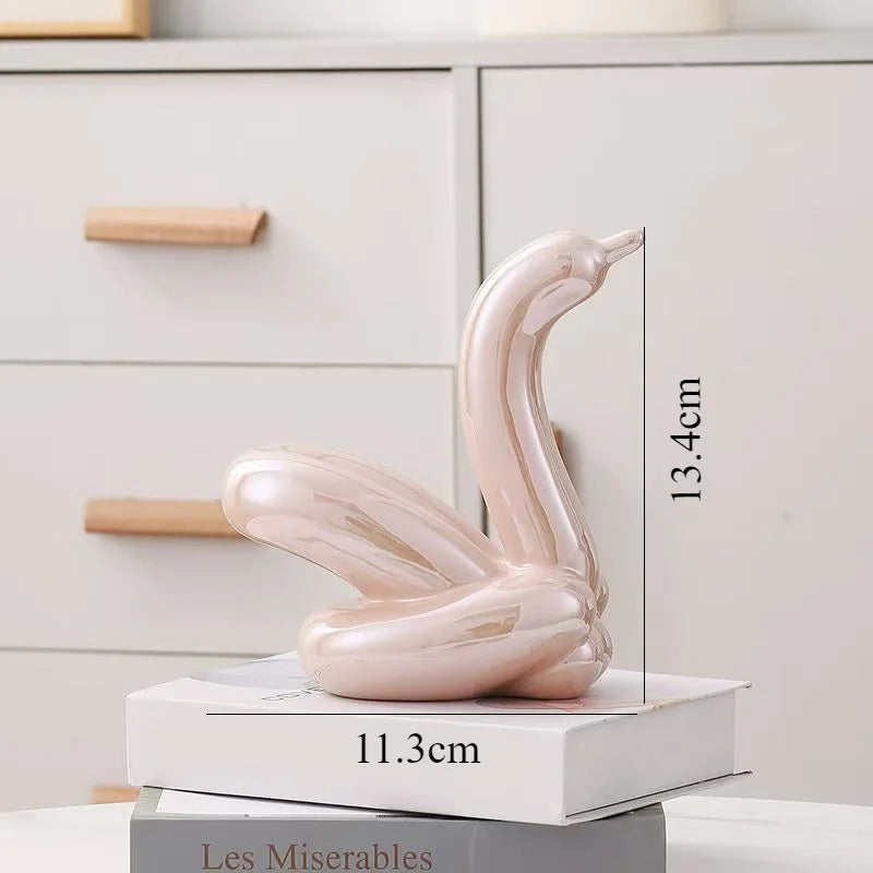 Perfecsy pink ceramic balloon swan sculpture, 13.4cm height, abstract decor ornament on Tampa Home & Garden Store