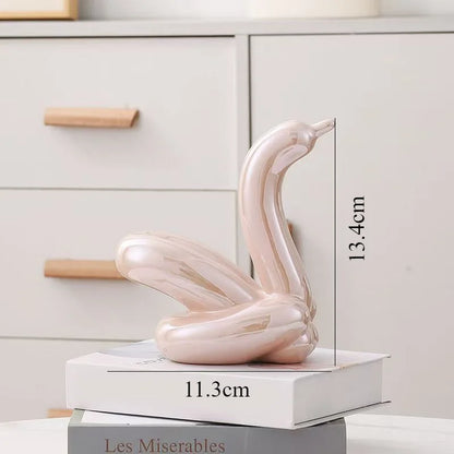 Perfecsy pink ceramic balloon swan sculpture, 13.4cm height, abstract decor ornament on Tampa Home & Garden Store