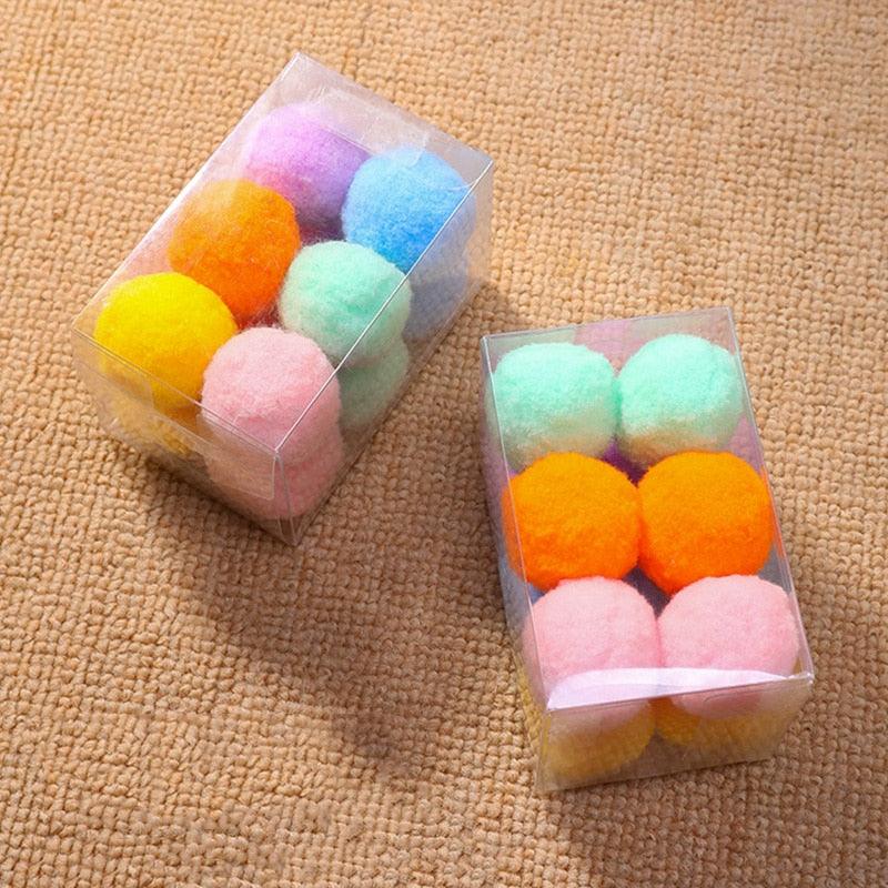 Cat plush ball toy set, Stevvex 12-pack pastel pom-pom balls in clear display boxes on Tampa Home & Garden Store