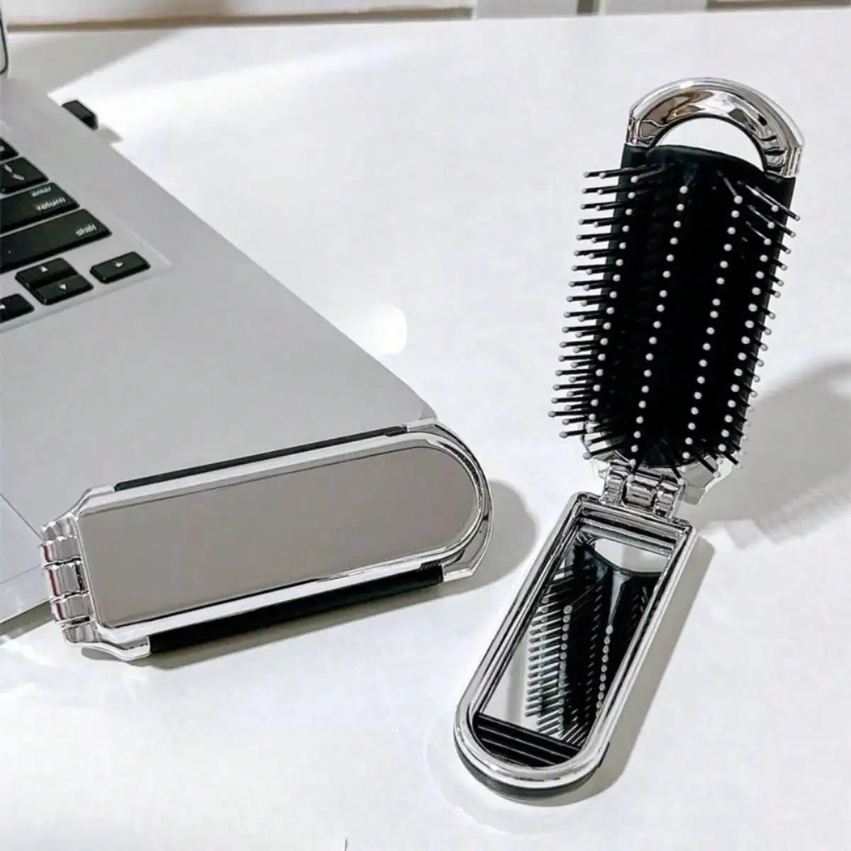 Portable compact air-cushion comb with handheld mirror in silver travel case 2pc by Silcy Skin on Tampa Home & Garden Store